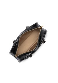 Black leather handbag with a glossy finish, featuring a gold zipper closure and a beige fabric interior, showcasing an open design.