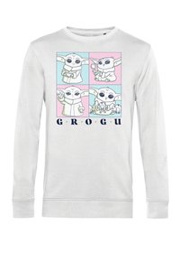 Sudadera de manga larga blanca con cuatro ilustraciones cuadradas de un personaje con grandes orejas y ojos expresivos. Texto "GROGU" debajo.
