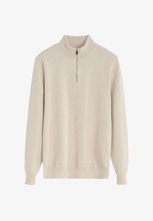 Pull beige à col zippé avec manches longues, texture côtelée et coupe décontractée. Il présente une fermeture à demi-zip et un design simple et minimaliste.