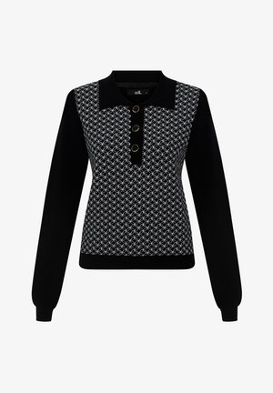 Czarny sweter z długimi rękawami, z wzorzystą górną częścią w kolorze białym, czarną listwą z trzema okrągłymi złotymi guzikami.