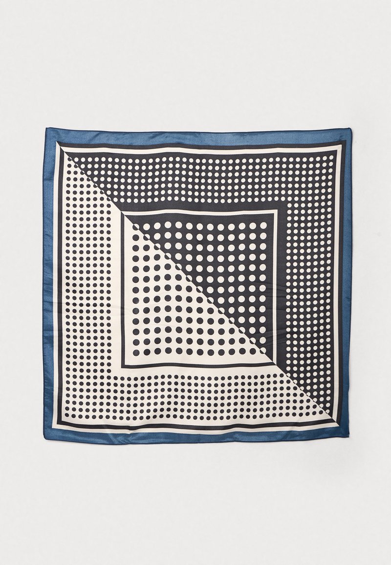 Foulard in seta con un design geometrico caratterizzato da pois alternati blu navy e crema, bordato da un bordo blu navy liscio.