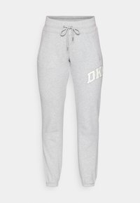 ARCHED DISTRESSED RHINESTONE LOGO RELAXED FIT JOGGER WITH POCKETS - Treniņtērpa apakšdaļas - beige