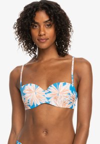 Blå og ferskenfarget trykket bikini-top med tynne stropper, hjerteformet utringning og rynket stoffdetalj. Stoffer ser glatt og elastisk ut.