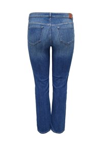 Indigo blue jeans with a straight leg design, five pockets, and a leather patch on the waistband. Visible fading on the lower legs.