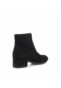 Black suede ankle boots with a round toe and a low block heel. The design features smooth texture and no visible hardware.