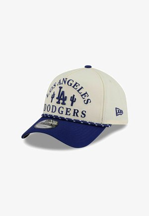 Beige-blauer Baseballcap mit dem Text "Los Angeles Dodgers", "LA" Logo, Kaktus-Symbolen und New Era Logo an der Seite.