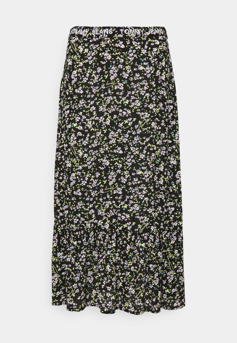 Gonna lunga floreale con sfondo nero, decorata con piccoli fiori viola e verdi, orlo arricciato e vita elasticizzata con logo.