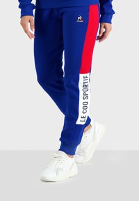 le coq sportif UNISEX Tracksuit bottoms electric blue/metallic blue