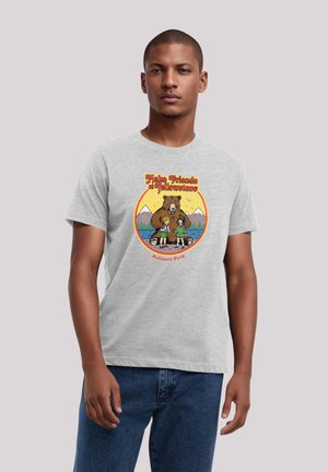 Gray cotton t-shirt featuring colorful graphic print of a bear and two children, with text “Make Friends at Yellowstone” and mountain background.