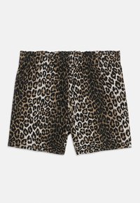 Leopardmönstrade shorts i mjukt tyg. Elastisk midja. I huvudsak bruna och beige med svarta accenter i ett prickigt mönster.