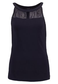 Marinblus utan ärmar med rund halsringning, som har ett genomskinligt panel vid framstycket och en nyckelhålsdetalj. Slät tygstruktur.