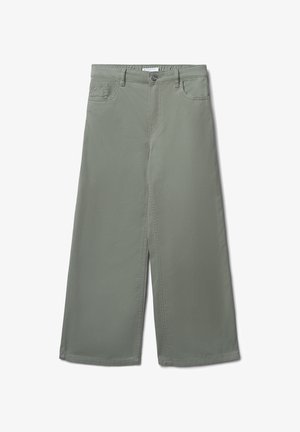 Pantalons larges gris en coton doux. Dotés d'une fermeture à bouton sur le devant, de deux poches latérales et d'une texture lisse.