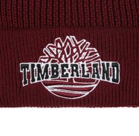 Berretto a maglia color bordeaux con logo Timberland ricamato in bianco e design dell'albero. Tessuto testurizzato con bordo a coste.