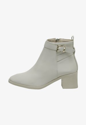 Korte laarzen - beige