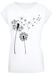 T-shirt blanc à manches courtes avec un graphique noir de pissenlit, des graines dispersées et des silhouettes de personnages parmi les fleurs.