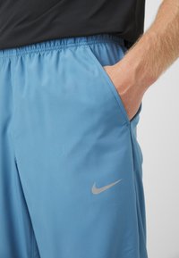 Nike Performance FORM PANT - Jogginghose - aegean storm/black/silver