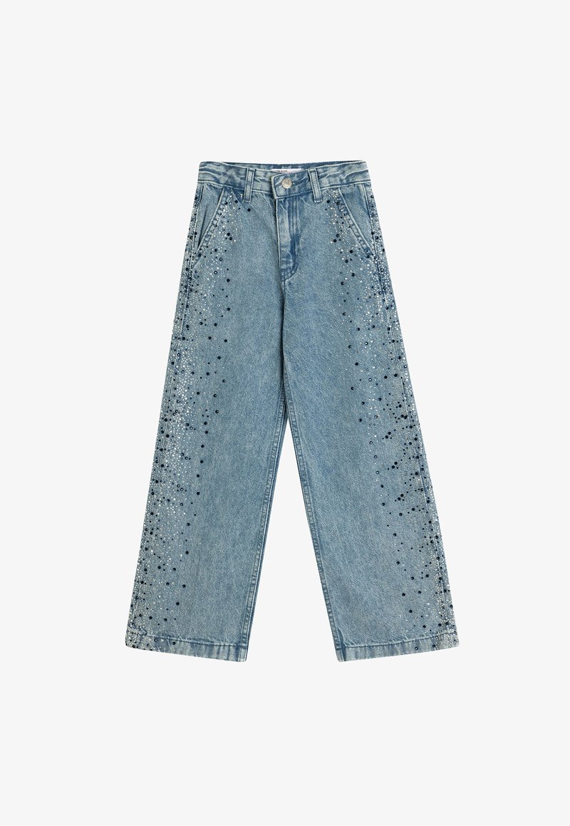 Vaaleansiniset leveälahkeiset farkut, joissa on ripoteltuna hopeisia ja mustia koristeita ulkopuolisilla saumoilla. Klassinen viiden taskun malli.