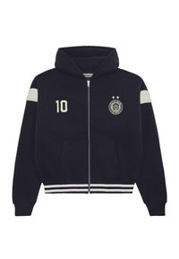 Navy blue zip-up hoodie with hood, white stripes on sleeves and hem, "10" patch on left chest, and circular emblem with two stars on right chest.