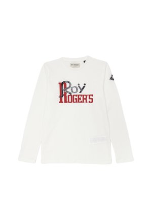 T-shirt bianca a maniche lunghe in cotone, con grafica testuale "Roy Roger's" in rosso e nero. Include un'etichetta rettangolare sull'orlo inferiore.