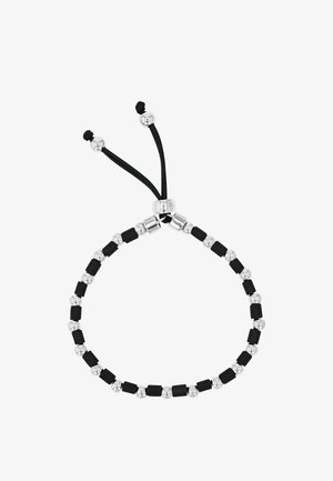 Verstelbare armband met afwisselend zwarte rechthoekige en zilveren ronde kralen op een zwart koord met zilveren kraaleinden.