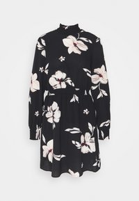 Musta kukallinen mekko pitkähihaisilla, jossa on korkea kaulus, joustava vyötärö ja iso valkoinen kukkakuosi punaisilla yksityiskohdilla.