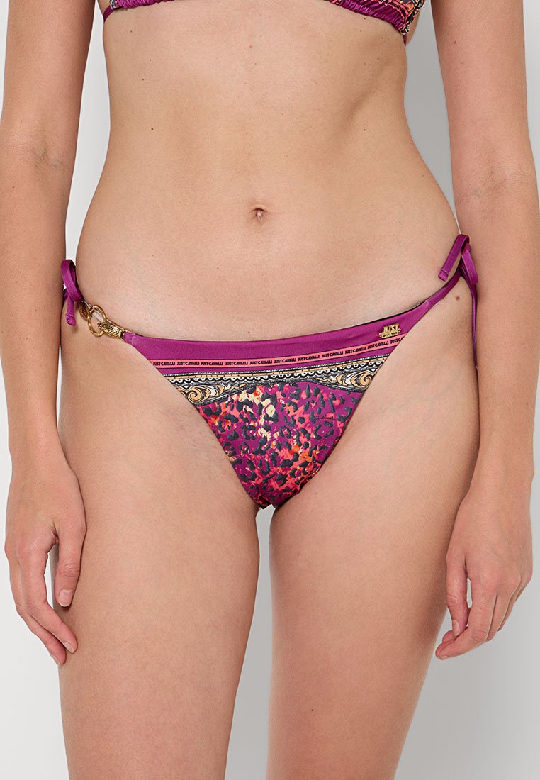 Bikini bottom in vibrant purple with a leopard print pattern, adjustable side ties, and gold-tone hardware accents. Satin-like texture.