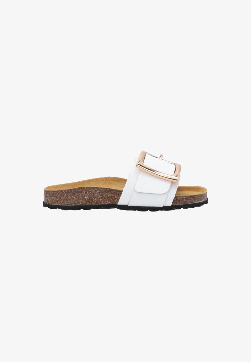 White slide sandal with a cork sole and black rubber outsole. Features a large metallic buckle accent on the strap. Smooth leather texture.