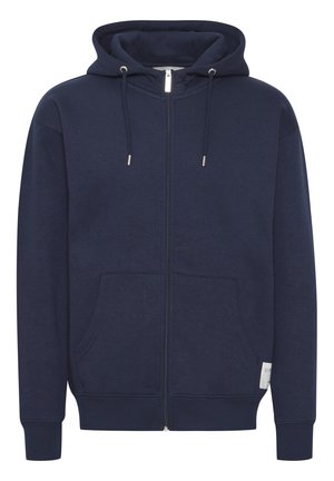 Marineblauw zip-up hoodie van zachte stof. Bevat een capuchon met trekkoord, voorzakken, geribde boorden en een klein logo op de mouw.