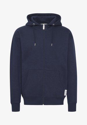 Marineblauw zip-up hoodie van zachte stof. Bevat een capuchon met trekkoord, voorzakken, geribde boorden en een klein logo op de mouw.