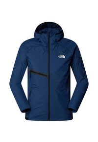 Mörkblå isolerad jacka med dragkedja, huva och en vänster bröstficka med en svart dragkedja. Har en logotyp på höger bröst.