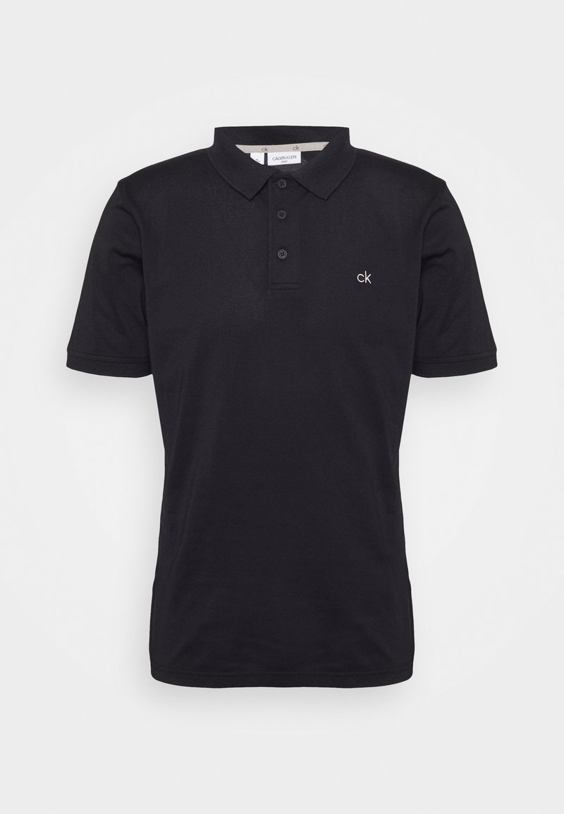Polo preta feita de algodão, com uma pala de três botões, mangas curtas e um pequeno logótipo "ck" bordado no lado esquerdo do peito.