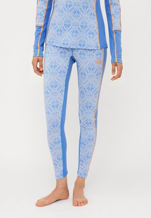 Leggings deportivos azules con un patrón de copos de nieve y acentos naranjas, hechos de una tela texturizada, con un diseño elegante y una forma ajustada.