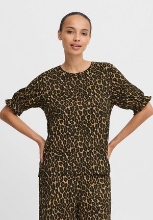 Leopard print top in a lightweight fabric, featuring a round neckline, short sleeves with gathered cuffs, and a relaxed fit.