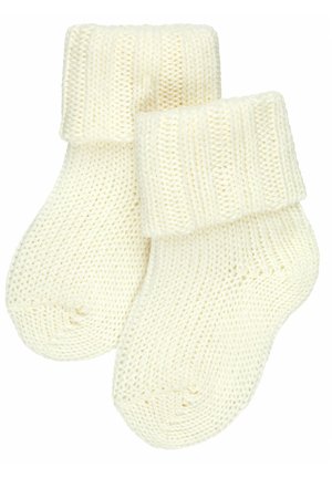 Gestrickte, cremefarbene Socken mit einem gerippten umschlagbaren Bündchen, das ein strukturiertes Muster und ein abgerundetes Zehendesign aufweist.