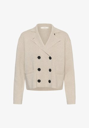 Beež kahekordse nööpimisega kootud kardigan kuue musta nupuga, laiade kraede, kahe eesmist tasku ja pikkade varrukatega.