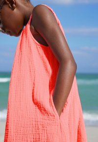 Next PLAYSUIT - Overal - coral pink