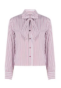 Blusa bianca con sottili righe verticali rosse, con maniche lunghe, chiusura a bottoni e un grande colletto a fiocco. Tessuto morbido.