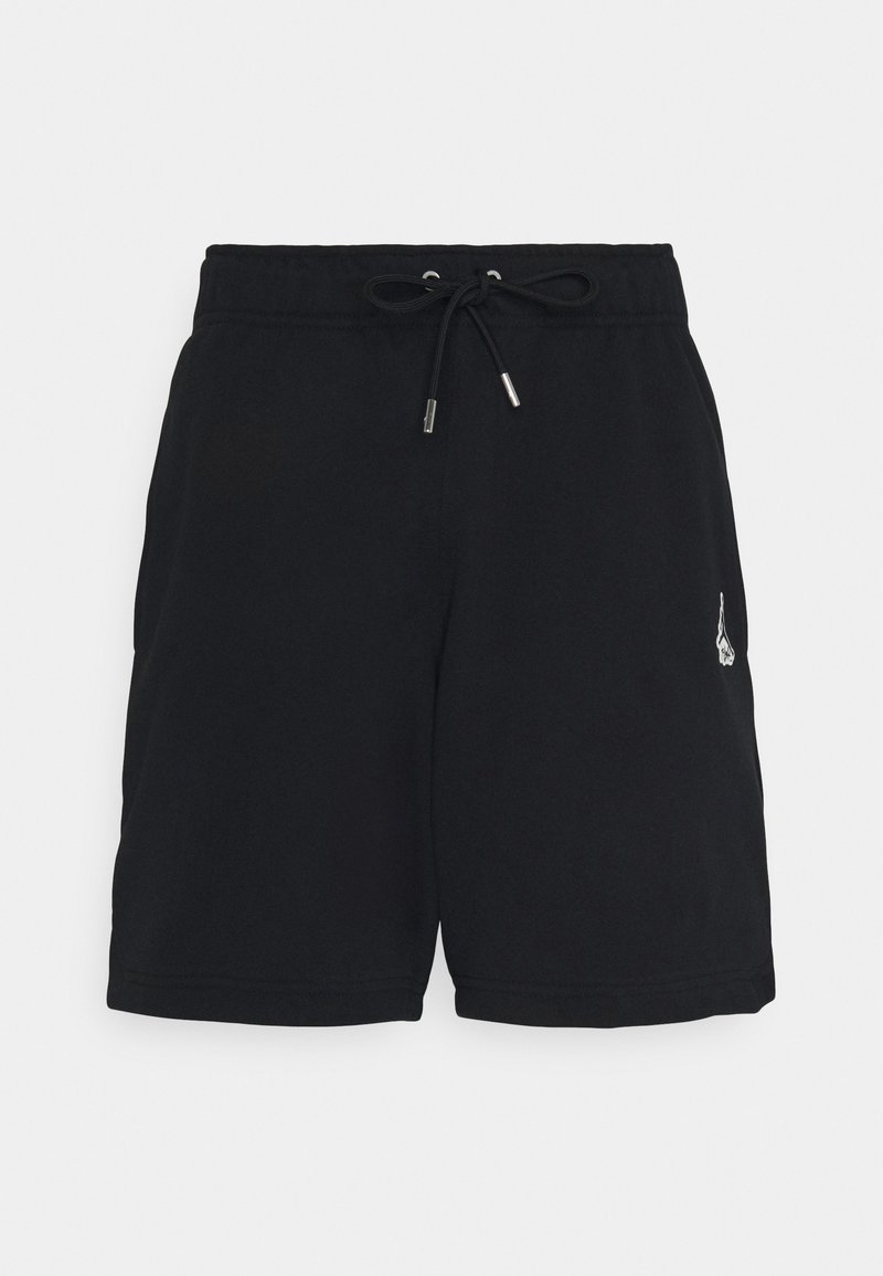 Shorts noirs avec cordon de serrage, taille élastique et petite broderie florale blanche sur la jambe droite, fond uni.