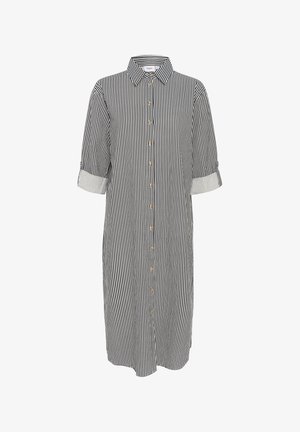 Robe chemise rayée en bleu marine et blanc, dotée d'un col, de manches retroussées et d'une coupe décontractée. Présentée sur un fond uni.