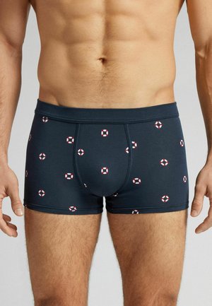 Navy boxer briefs made of stretchy fabric with red and white lifebuoy patterns throughout, featuring a snug waistband and fitted design.