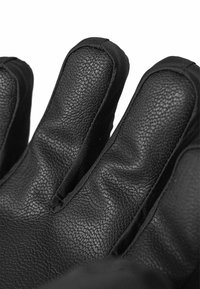 Svarta läderhandskar med strukturerad yta, med vadderade sektioner och elastiska manschetter för en tät passform. Vinklad fingersdesign.