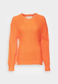 Wafelpatroon oranje trui met lange mouwen, ronde halslijn en geribde manchetten en onderrand. Lichtgewicht textuur, ontspannen pasvorm, casual stijl.