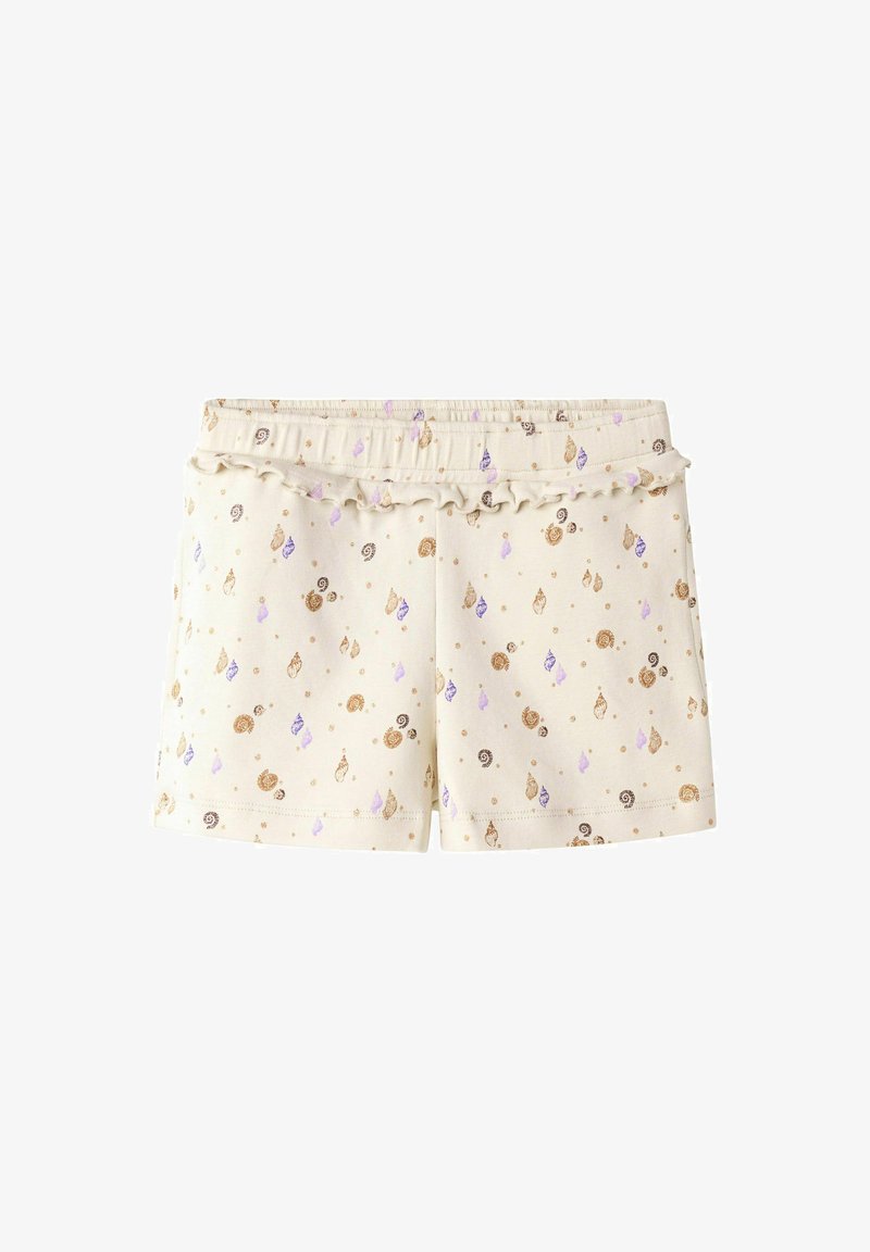Cotton shorts in cream with a ruffled elastic waistband. Features a pattern of seashells and drops in gold, purple, and brown.