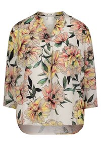 Blusa bianca a V con maniche lunghe, caratterizzata da un grande motivo floreale in tonalità di giallo, rosa e foglie verdi.