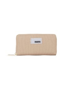 Beige stofpung med en glat overflade, lynlås-lukning og en lille hvid label med "RENEW" i fede bogstaver.