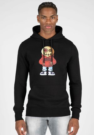 Black hoodie featuring a colorful graphic of a character with a round head and a stitched mouth, wearing a red shirt and blue jeans.