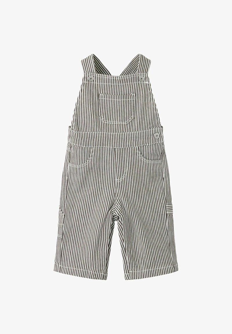 Salopette rayée noire et blanche pour tout-petit avec poche avant, deux poches latérales et bretelles boutonnées sur fond blanc.