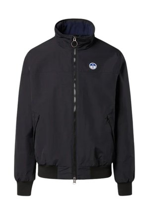 Giubbotto bomber nero con colletto alto, zip frontale, tasche laterali e un logo circolare sul petto sinistro. Materiale morbido e leggero.
