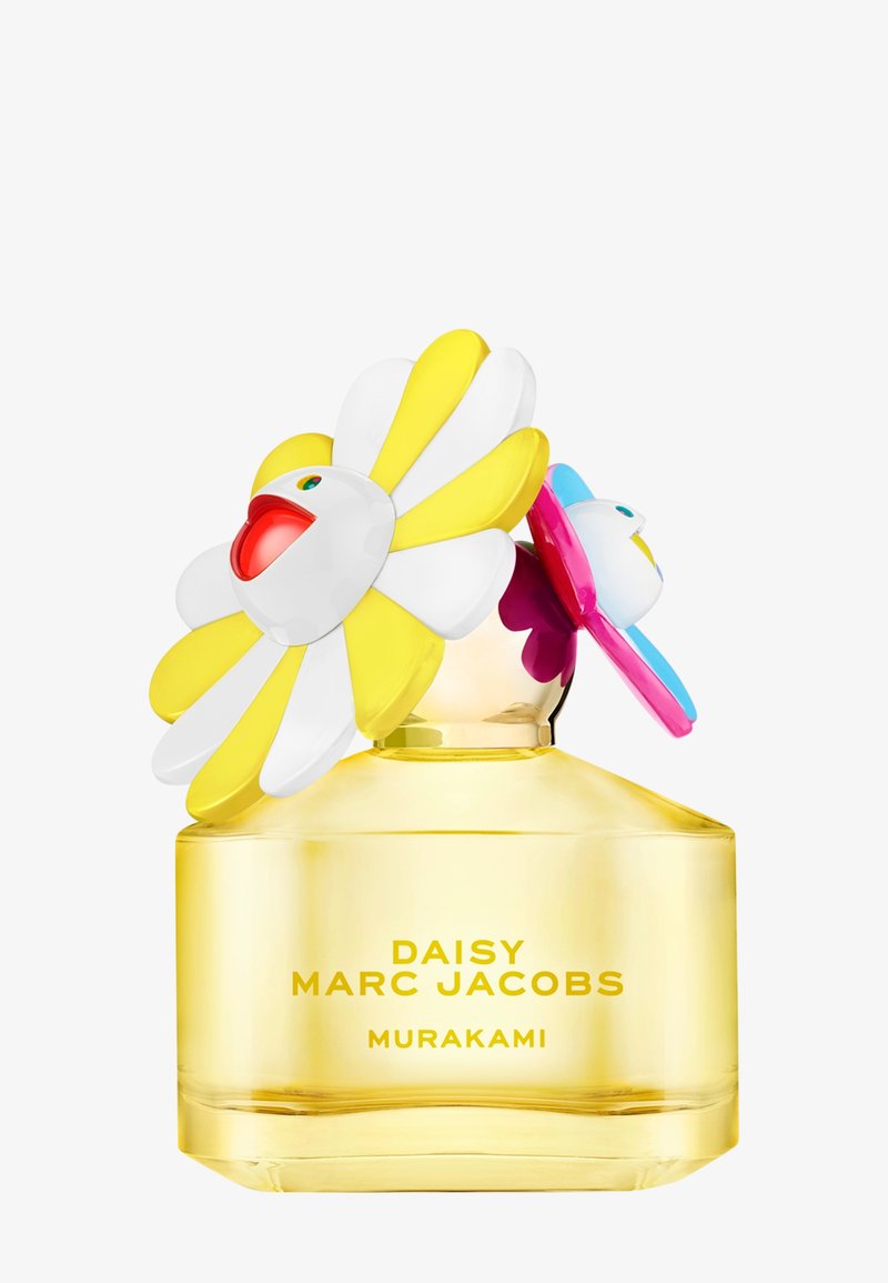 Flacon de parfum Daisy Marc Jacobs Murakami teinté de jaune avec des bouchons de fleurs décoratives souriantes en blanc, jaune, rose et bleu.