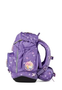 Zaino viola con motivo a pois, design arrotondato, molteplici tasche, un distintivo di unicorno e spallacci imbottiti. Realizzato in tessuto resistente.